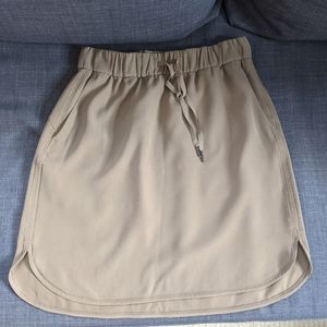 Lululemon On the Fly Skirt SZ 8 Tan